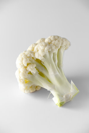 Cauliflower piece isolated on a white background. Fresh white cauliflower close upの写真素材