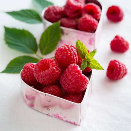 Raspberries in a heart shaped container