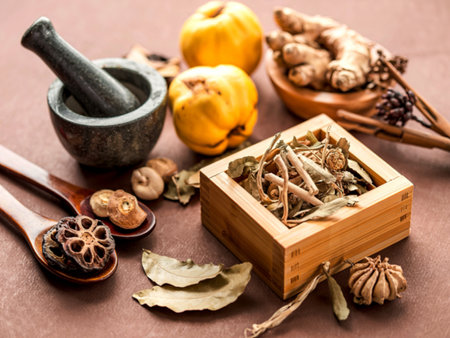 Alternative health care dried various Chinese herbs in wooden box , dried quince ,ginger and lotus seedの写真素材