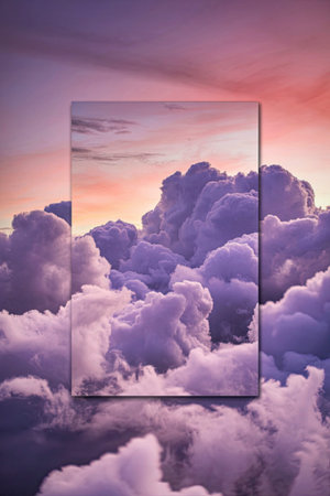 A breathtaking view of fluffy clouds set against a vibrant sunset sky, with hues of pink, purple,...