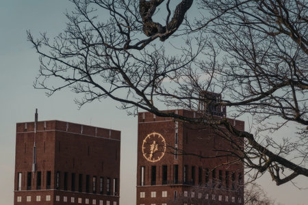 City building with neon horse sign and large tree, cloudy sky background.