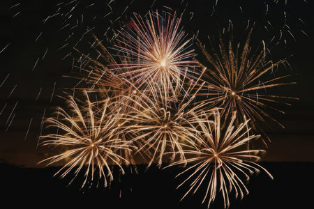 A stunning display of vibrant fireworks exploding in the night sky, creating a kaleidoscope of colors and patterns.