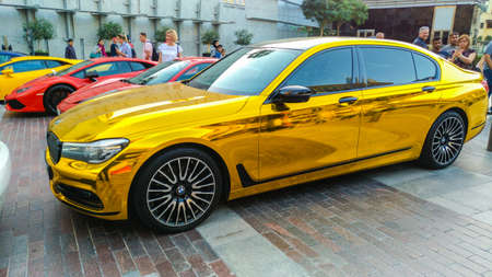 Dubai, United Arab Emirates, Junuary 20th, 2020 : Luxury sports cars at downtown Dubai next to Burj Khalifa, United Arab Emiratesのeditorial素材