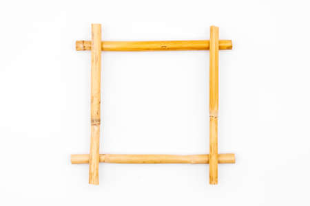 Bamboo frame on white studio background