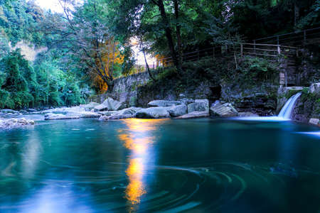 Breggia river flowing during a summer evening, in the Parco delle gole della Breggia, Switzerlandの写真素材