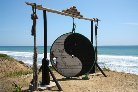 Ying and yang symbol with ocean as backgroundの写真素材