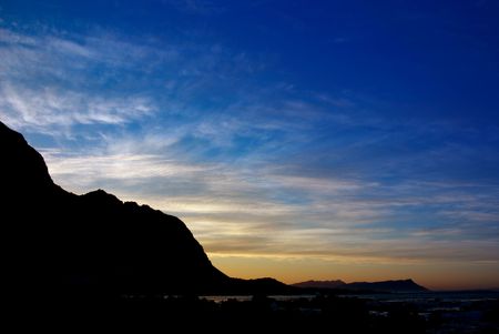 Landscape of the ocean at sunset in Gordon's Bay, South Africa