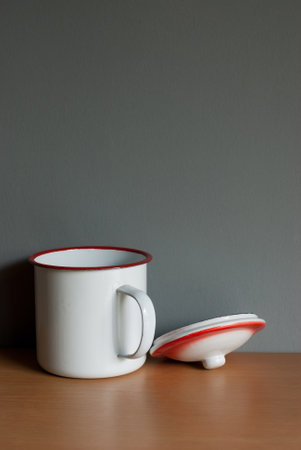 Vintage zinc mug style on a wooden floor. Space for text.の写真素材