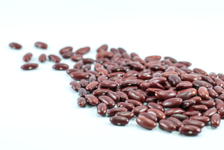 A pile of red beans on a white floor, selective focus.の写真素材