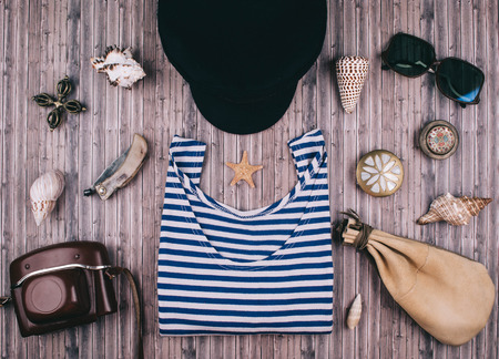 Summer holiday background, travel concept with vintage camera on wooden table background. Flat lay style.の写真素材