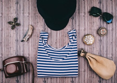 Summer holiday background, travel concept with vintage camera on wooden table background. Flat lay style.の写真素材
