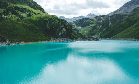 Majestic mountain lake in Switzerland. Idyllic landscape with clear mountain lake in the Alps.の写真素材