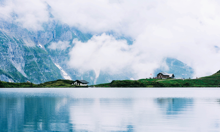Majestic mountain lake in Switzerland. Idyllic landscape with clear mountain lake in the Alps.の写真素材