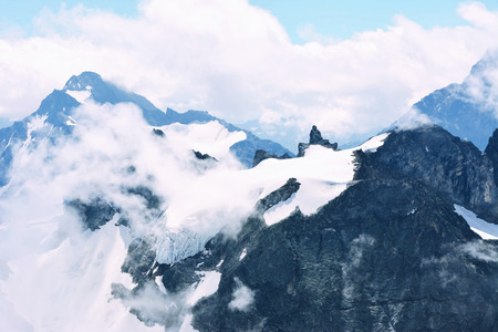 View of beautiful landscape in the Alps with snow-capped mountain tops.の写真素材