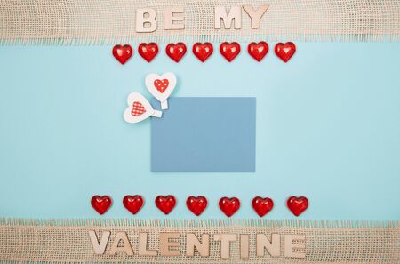 Red heart against blue background.の写真素材