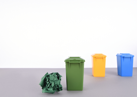 Colorful recycle bins on white and gray background. Recycling concept.の写真素材