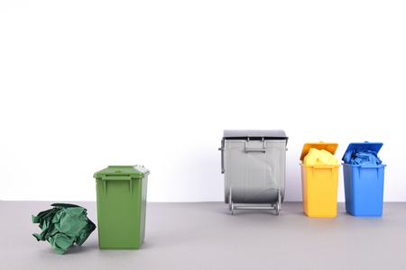 Colorful recycle bins on white background.の写真素材