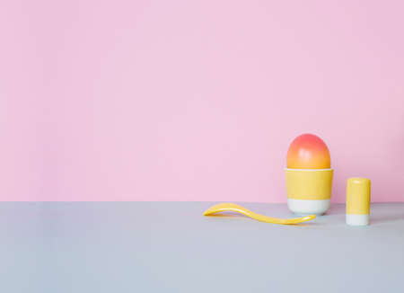 Easter eggs on pastel background. Creative easter concept, minimal style.の写真素材