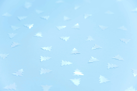Colorful celebration background with party confetti on pastel blue background. Flat lay.の写真素材