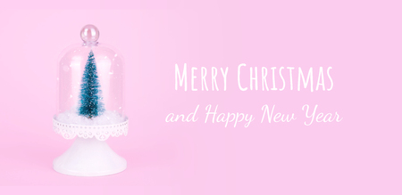 Creative Christmas design on pink pastel color background with Christmas tree. Xmas and holiday concept.の写真素材