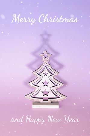 Christmas tree over pink background. Xmas and holiday concept.の写真素材