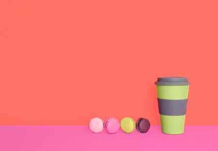 Cup of coffee to go with macaron with place for your text. Color of the year 2019.の写真素材
