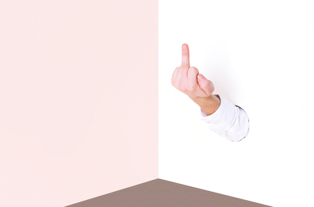 Offensive gesture, middle finger on trendy background. Fuck you concept.の写真素材