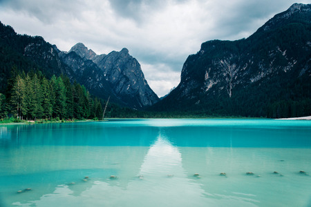 Dobbiaco Lake in the Dolomites Alps, summer landscape, Bolzano, Italy.の写真素材