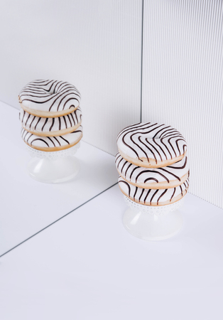 Striped donuts on a white background. Stylish minimal conceptの写真素材