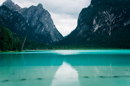 Dobbiaco Lake in the Dolomites Alps, summer landscape, Bolzano, Italy.の写真素材