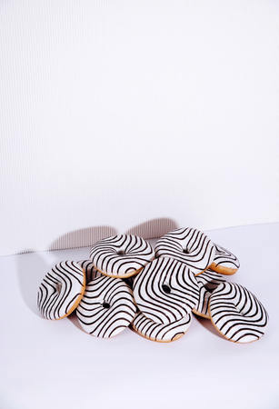 Striped donuts on a white background. Stylish minimal conceptの写真素材