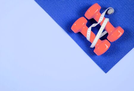 Flat lay shot of sneakers on pink background with copy space for your text.の写真素材