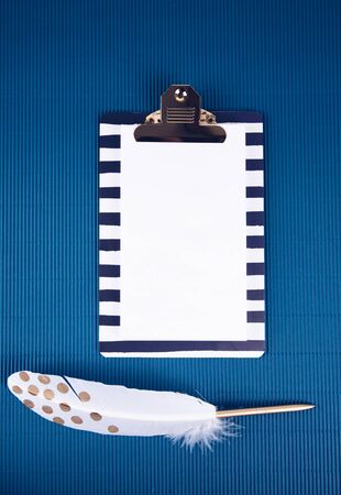 School supplies on a blue background. Trendy color. Overhead shoot.の写真素材