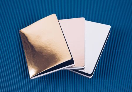 School supplies on a blue background. Trendy color. Overhead shoot.の写真素材