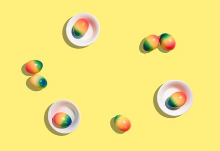 Painted eggs on pastel background. Creative minimal concept.の写真素材