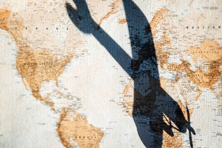 World map plane tracks. Aviation on world map. Aircraft planes fly air transportation track.の写真素材