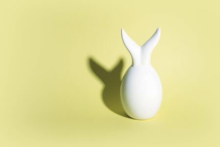 Painted eggs on pastel background. Creative minimal concept.の写真素材