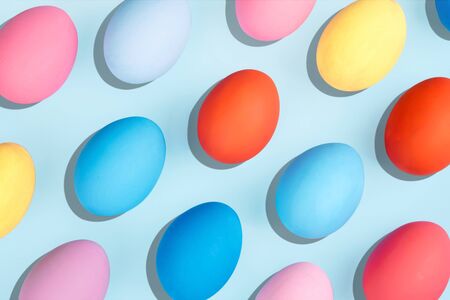 Painted eggs on pastel background. Creative minimal concept.の写真素材