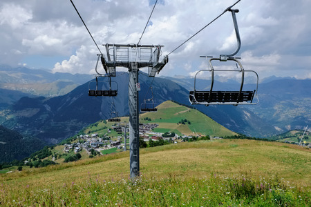 Ski lift mast in a summer mountain landscape at Col de Mollard in the french Alpsの写真素材