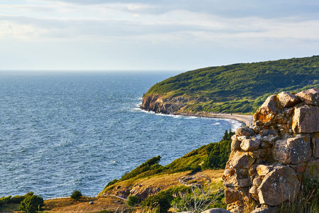 looking north, up the western coast line of Bornholm, from the top of Hammershus castle ruinの写真素材