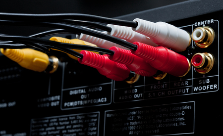 Wires plugged in to the connection panel of a dvd playerの写真素材