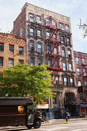 NEW YORK CITY - OCTOBER 16, 2014: Typical old Lower Eastside apartment (tenament) building with an...