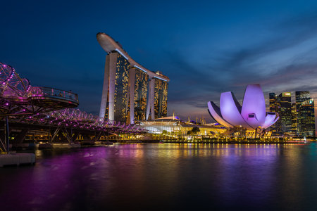 Sunset at Marina Bay with the Marina Bay Sands Hotel and the Art Science Museumのeditorial素材
