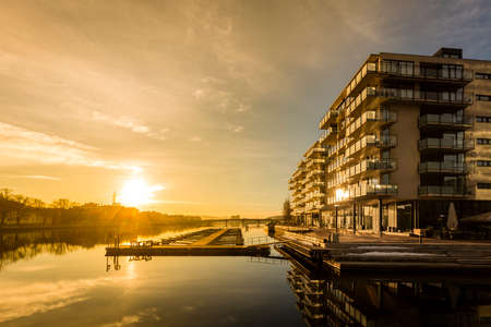 Sunrise in Drammen, Norway with new apartment buildings just next to the river Drammenselvenの写真素材
