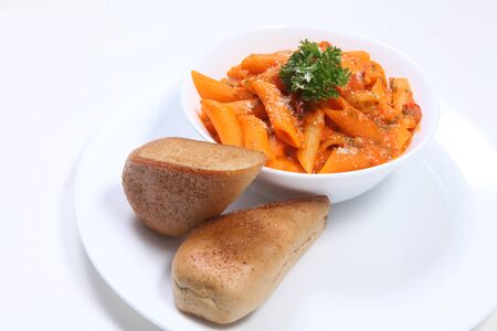 Red Sauce Pasta with Garlic Breadの写真素材