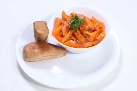Red Sauce Pasta with Garlic Breadの写真素材