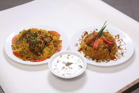 Chicken and Mutton Biryani with Raitaの写真素材