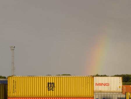 Shipping Containers at The Port of Felixstowe Docks await being tranfered to a ship.のeditorial素材
