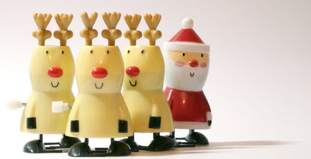 Reindeer with Santa in the backgroundの写真素材