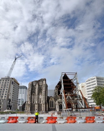 Christchurch, New Zealand - March 10, 2012: Panoramic view of the ruins of the Anglican Cathedral on March 10, 2012 in Christchurch. In the background cranes dismantle the remaining office blocks in the CBD.のeditorial素材